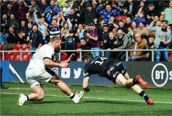  ?? ?? Luke Morahan dives over for one of his two tries in Bristol’s Champions Cup second leg defeat by Sale