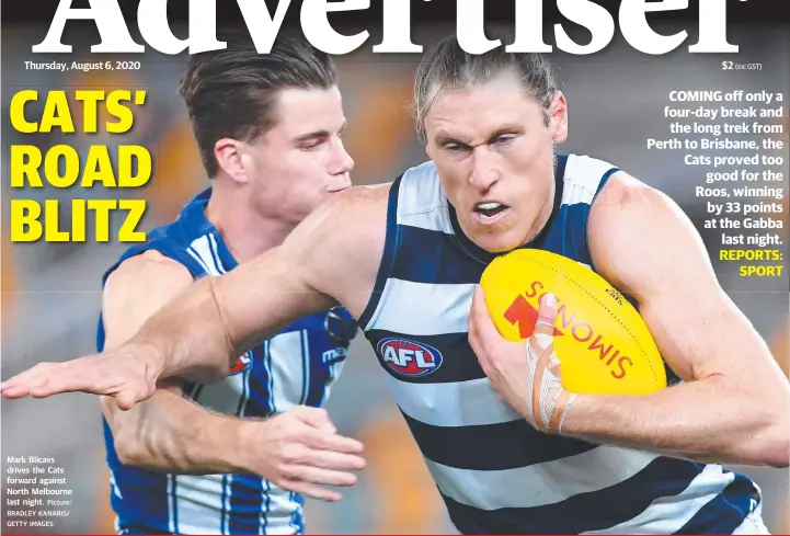  ?? Picture: BRADLEY KANARIS/ GETTY IMAGES ?? Mark Blicavs drives the Cats forward against North Melbourne last night.