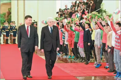  ?? LI XUEREN / XINHUA ?? President Xi Jinping welcomes Italian President Sergio Mattarella during a ceremony on Wednesday at the Great Hall of the People in Beijing. Mattarella’s six-day visit to China will include trips to Shanghai, Chongqing and Xi’an.