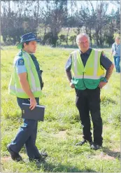  ??  ?? James talks with Senior Sergeant Jymahl Glassey at the train crash exercise in March.