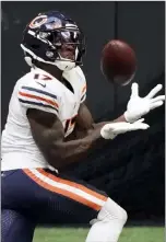  ?? John Bazemore The Associated Press ?? Bears wide receiver Anthony Miller makes a touchdown catch against Atlanta in a furious second-half rally that saw the Bears come from 16 points down in the fourth quarter to win.