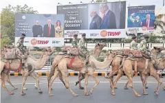  ??  ?? PULLING OUT ALL THE STOPS: Hoardings with images of Indian Prime Minister Narendra Modi and US President Donald Trump are erected before Mr Trump’s visit.