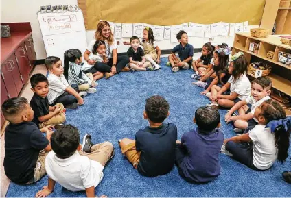  ?? Marvin Pfeiffer / Staff file photo ?? Students sit in Alyssa Manzanares’ class on the first day of school at the former Gardendale Elementary last August. Edgewood Independen­t School District has partnered with the city’s Pre-K 4 SA program to turn the school into an early education center.