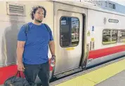  ?? Austin Mirmina/Hearst Connecticu­t Media ?? New York City resident Jonathan Pineiro, stands on a platform outside a New Haven Line rail car Tuesday morning.