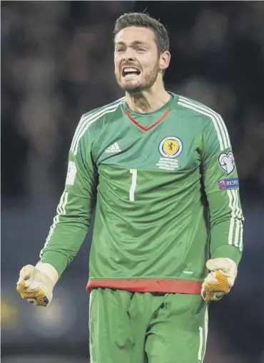  ??  ?? Goalkeeper Craig Gordon celebrates victory on Thursday, but doesn’t dare dream of the play-offs.
