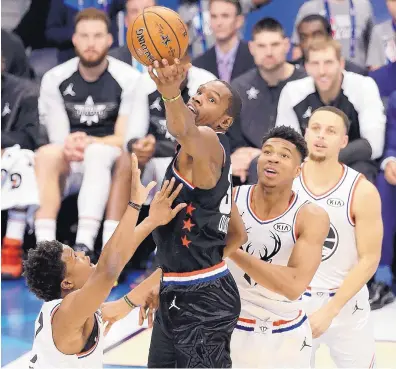  ?? GERRY BROOME/ASSOCIATED PRESS ?? Team LeBron’s Kevin Durant, of the Golden State Warriors, scored 31 points against Team Giannis and was named the All-Star Game MVP in Charlotte, N.C. on Sunday.