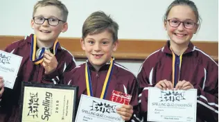  ?? PHOTOS: GRETA YEOMAN ?? Qmiling success . . . Year 5 and 6 Otago Daily Times Extra! central Qouth Island quiz winners (from left) Luke Winter (11), Jack Houstoun (9) and Mackenzie Walker (11), of Gleniti Qchool, show off their prizes.