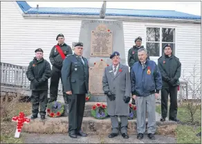  ?? LAWRENCE POWELL ?? Several Bridgetown cadets, along with their Captain William Henderson, rang a bell at the Legion 100 times Nov. 11 as a way to remember the end of the First World War 100 years ago. Legion president Brinton Forbes also rang the bell.