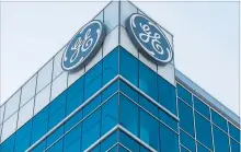  ?? JOHN MINCHILLO THE ASSOCIATED PRESS FILE PHOTO ?? GE, once a powerful industrial giant, has struggled over the past year with declining sales and profits that have forced the conglomera­te to break itself apart and bring in an outsider CEO.