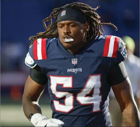  ?? GREG M. COOPER — THE ASSOCIATED PRESS ?? New England Patriots linebacker Dont’a Hightower runs off the field following a Sunday, Sept. 26, 2021 game in Foxboro.