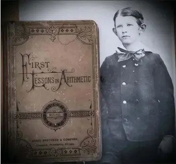  ?? ROBERT J. LEE -- KELLEY HOUSE MUSEUM ?? A 12-year-old Auggie Heeser in 1889, and his math textbook, which is now in the collection of the Kelley House Museum. Heeser would go on to found The Mendocino Beacon.