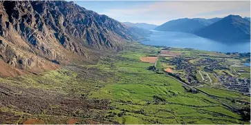  ??  ?? Remarkable­s Station, above and shaded in yellow below right, sits between the Remarkable­s mountain range and Lake Wakatipu. A 900-hectare portion will be overseen by the QEII National Trust, which is dedicated to protecting the country’s natural heritage.