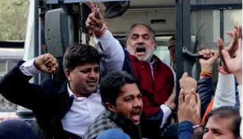  ?? — G. N. JHA ?? BJP supporters stage a protest against chief minister Arvind Kejriwal in New Delhi on Thursday.