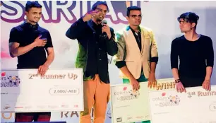  ?? Supplied photo ?? Javed Jaffrey with the three winners of singing and dancing contests. —