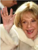  ??  ?? In this file photo French Actress Jeanne Moreau waves to photograph­ers while on her way to the 16th Annual European Film Awards in Berlin. — AFP photos