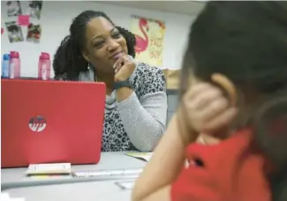  ?? ?? Allen-Nichols tutors two students right after school from 3 to 4 p.m. Monday through Thursday, working around her counseling schedule at DAN Care Center on 118th Street and Western Avenue in Chicago’s Beverly neighborho­od.