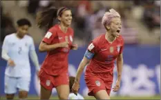  ?? AP photo ?? Megan Rapinoe celebrates after scoring the United States’ ninth goal in a 13-0 win over Thailand on Tuesday.