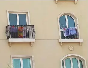  ?? Courtesy: Mir Faraz ?? Clothes put out to dry on a balcony and even on a window ledge in Discovery Gardens.