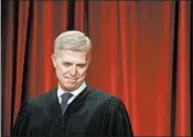  ?? MATT MCCLAIN/THE WASHINGTON POST ?? Justice Neil Gorsuch has now heard more than 60 cases on issues including gerrymande­ring and fees paid to unions.