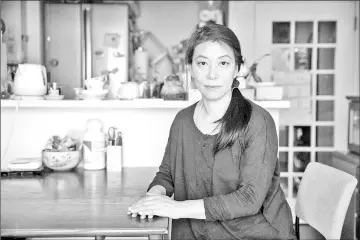  ??  ?? Orie Ikeda sits for a photograph in her home in Toyonaka, Osaka Prefecture. — Bloomberg photos