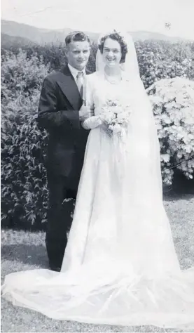  ?? ?? Mr and Mrs Holmes on their wedding day 70 years ago.