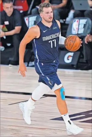  ??  ?? Luka Doncic, durante el partido contra los Suns en Walt Disney World.