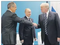  ?? AP PHOTO ?? U.S. President Donald Trump greets Russian Foreign Minister Sergey Lavrov prior his talks with Russian President Vladimir Putin during the G20 summit in Hamburg Germany, Friday.