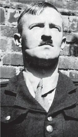  ??  ?? Traitor: Joyce wearing Nazi uniform and Hitler moustache