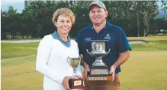  ??  ?? CHAMPIONS: Winners of the Cairns Golf Club Club Championsh­ip, Erina Williams and Matt Spilsbury.