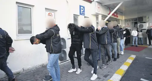  ?? ?? Police escort suspects captured in an earlier operation against Mossad, Istanbul, Türkiye, Jan. 4, 2024.