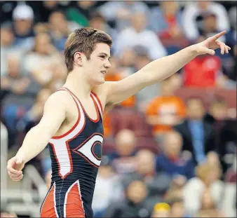  ?? ROBERTSON/DISPATCH] [KYLE ?? Nate Keaton of Circlevill­e celebrates after winning the 113-pound title in Division II.