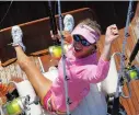  ??  ?? Tiffany Ramsey celebrates a blue marlin release during the Keli Wagner Lady Angler Tournament.