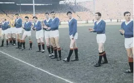  ?? ?? 0 A Rangers pre-match line-up from the 1960-61 season featuring an impressive four players who scored 100 goals for the club - Davie Wilson (far left), Jim Forrest (fourth from left), John Greig (centre) and Ralph Brand (second from right)