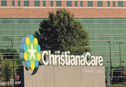  ?? BENJAMIN CHAMBERS/DELAWARE NEWS JOURNAL ?? Christiana­Care signage and a segment of the hospital is featured at Ogletown Stanton Road in Christiana on Oct. 12, 2023.