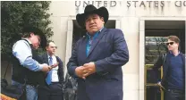  ?? CLIFF OWEN/THE ASSOCIATED PRESS ?? Chairman Harold Frazier of the Cheyenne River Sioux Tribe leaves federal court Tuesday in Washington, D.C. A federal judge is considerin­g a request by the Standing Rock and Cheyenne River Sioux tribes to order the Army Corps of Engineers to withdraw...