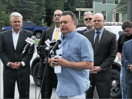  ?? NICHOLAS BUONANNO -- NBUONANNO@TROYRECORD.COM ?? Tim Murdick, exeuctive director of the Nopiates Committee in West Sand Lake, speaks about combating the opioid epidemic during a news conference at the Jiff-E-Mart in North Greenbush Wednesday.