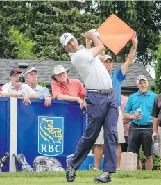  ??  ?? Matt Kuchar hits from the 17th tee during the Canadian Open pro-am on Wednesday. Kuchar finished second at the British Open last weekend.