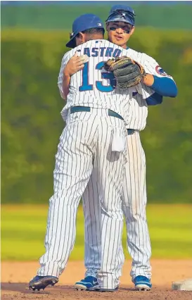  ?? | GETTY IMAGES ?? Second baseman Darwin Barney (right) is a candidate to win his second consecutiv­e Gold Glove. Starlin Castro has played well at short in the second half.