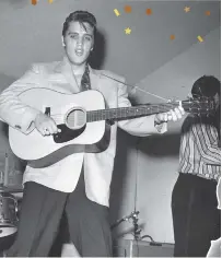  ?? FILE PHOTO/FORT WORTH STAR-TELEGRAM ?? Elvis Presley plays guitar during a concert in Fort Worth, Texas, early in his career.