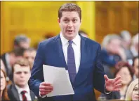  ?? CP PHOTO ?? Conservati­ve Leader Andrew Scheer responds after the federal budget was delivered in the House of Commons in Ottawa on Tuesday.