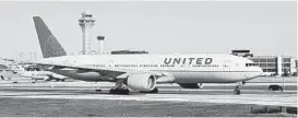  ?? DANIEL SLIM/GETTY-AFP ?? United Airlines posted a $1.8 billion loss in the third quarter as revenues plunged sharply.