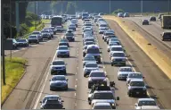  ?? Hearst Connecticu­t Media file photo ?? A view of rush hour traffic along Interstate 95 northbound from the Exit 18 overpass in Westport.