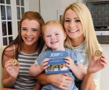  ??  ?? Finding a cure Beth, Anna and Pauline are fundraisin­g for type 1 diabetes charity JDRF