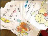  ?? Submitted photo ?? IN LIVING COLOR: The Syrian Emergency Task Force recently received colorings from students in the Wisdom House school for orphans in a village of the Idlib Governorat­e province in northwest Syria. The SETF plans to distribute them to school, community...