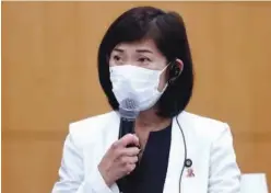  ?? Agence France-presse ?? ↑
Tokyo Olympics Minister Tamayo Marukawa speaks during the five-party meeting in Tokyo on Thursday.