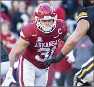  ?? (NWA Democrat-Gazette/Charlie Kaijo) ?? Arkansas linebacker Grant Morgan is a finalist for the second year in a row for the Burlsworth Trophy, given to the nation’s top player who began his career as a walk-on, and is also a finalist for William V. Campbell Trophy, known as the academic Heisman Trophy in college athletics.