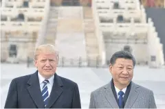  ?? AFP ?? In this file photo taken on November 8, 2017, US President Donald Trump and his Chinese counterpar­t Xi Jinping pose at the Forbidden City in Beijing.