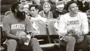  ?? Elizabeth Conley / Staff photograph­er ?? Rockets guards James Harden, left, and Russell Westbrook showed few signs of their delayed arrivals to the NBA campus during Friday’s scrimmage.