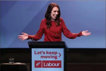  ?? Michael Bradley/AFP via Getty Images ?? New Zealand Prime Minister Jacinda Ardern speaks in Auckland at the Labour Election Day party after the Labour Party won New Zealand’s general election.