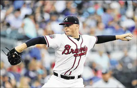  ?? AP ?? Pitcher Sean Newcomb impressed manager Brian Snitker in his second MLB start Friday, against Miami. “It didn’t go the way I wanted it to, but I was kind of able to make some pitches, get out of a couple of jams,” Newcomb said.